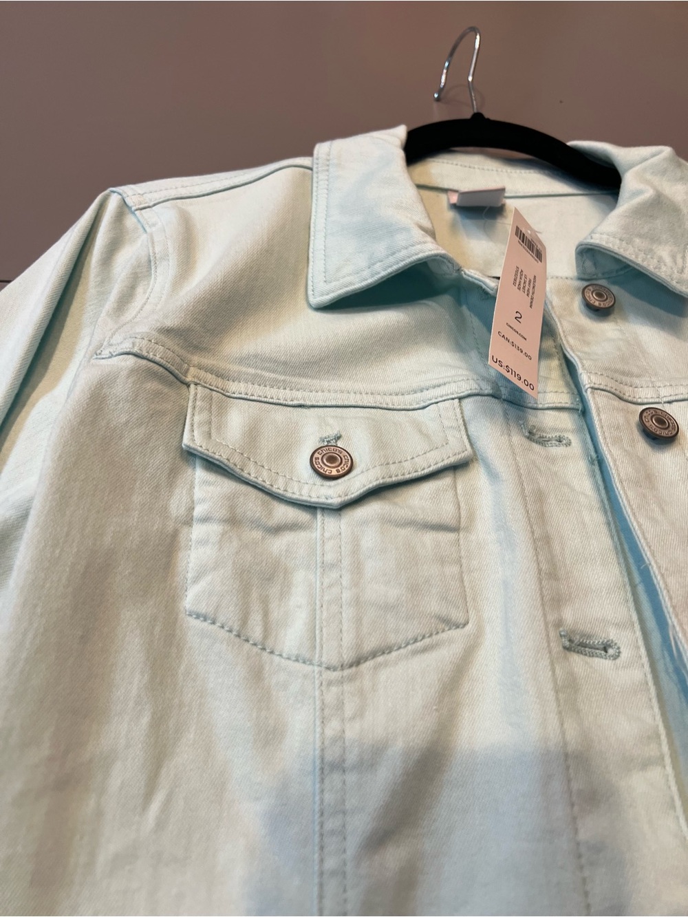 New with tags. Chicos size 2 midlength fray hem long sleeve jacket in aqua haze